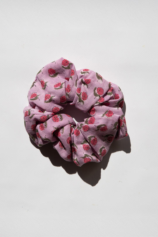 Daughters of India Upcycled Scrunchie in Violet, a pink hair scrunchie made from upcycled fabric with a floral print design